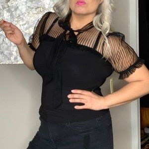 Black blouse with see-through arms